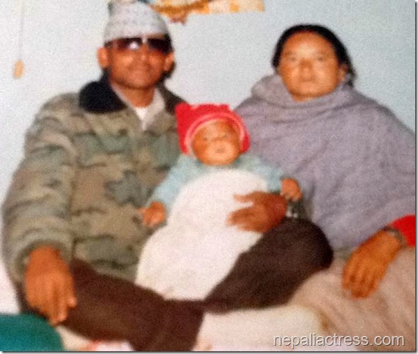 rajani kc-childhood photo -mom and dad
