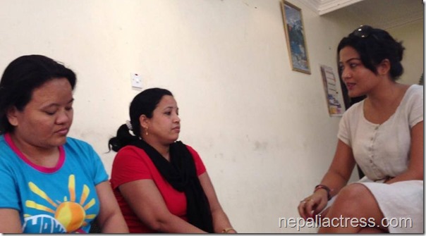 rekha with nepali workers in Qatar